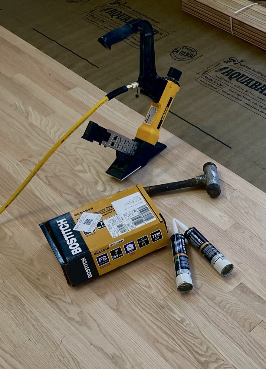 Hardwood floor installation completed by Peter Laki